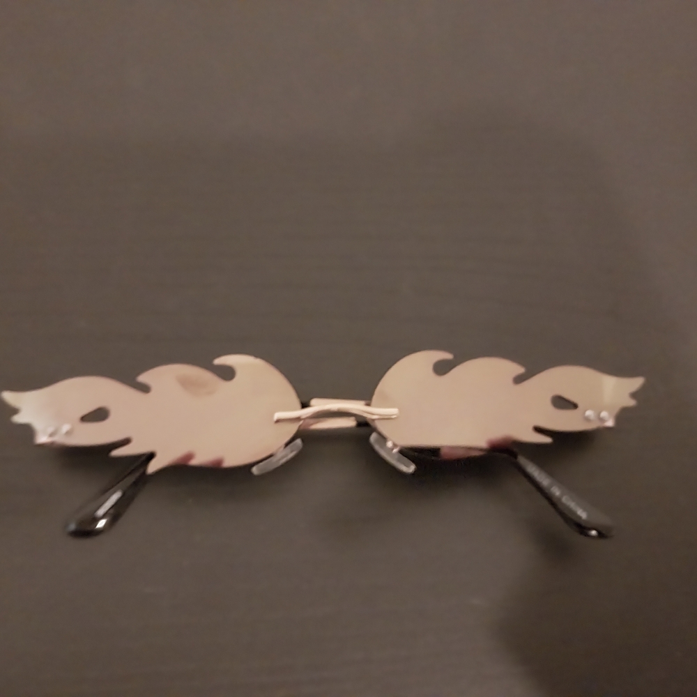 Flame-Shaped Rimless Sunglasses in Metallic Rose